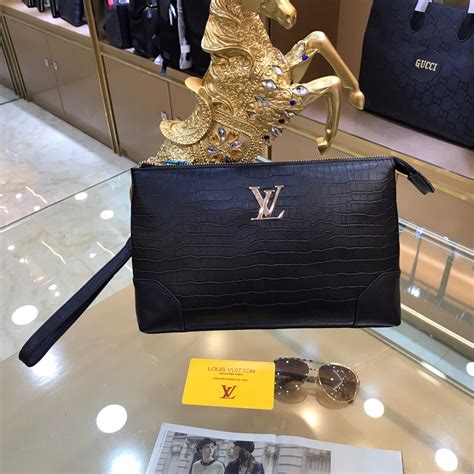 louis vuitton clutch bag price.